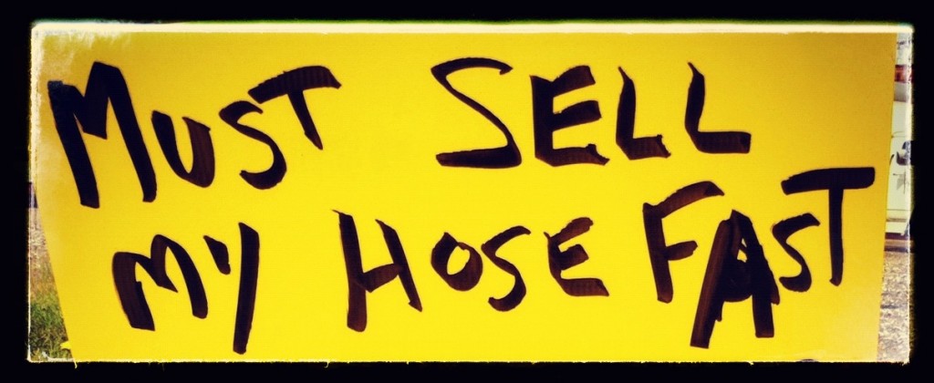 Sign with typo: Must Sell my Hose